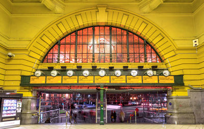 People in illuminated room