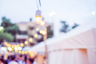Low angle view of illuminated building against sky