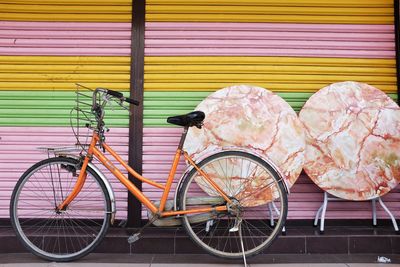 Bicycle with pink umbrella