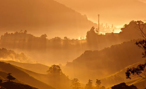 Panoramic view of landscape against sky during sunset