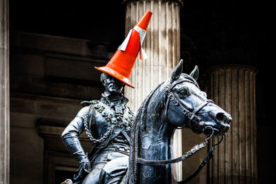 Mid section of man with horse