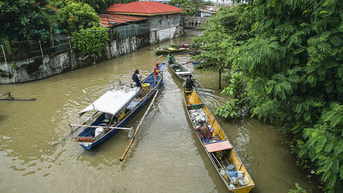 High angle view of boats moored in river