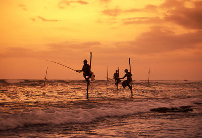 Scenic view of sea at sunset