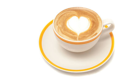 Close-up of coffee cup over white background