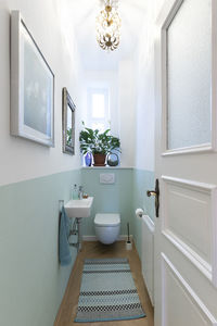 Interior of bathroom seen through doorway at home