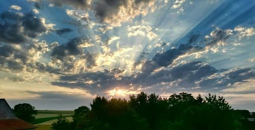 Scenic view of landscape against cloudy sky