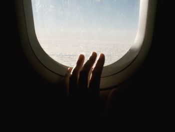 Cropped image of airplane wing