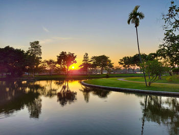 Scenic view of lake against sky during sunset