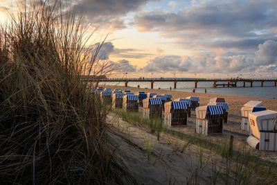 Scenic view of beach against sky during sunset