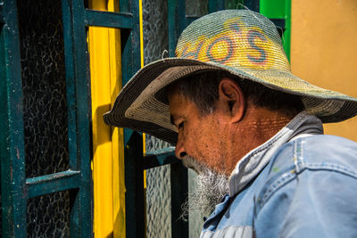 Close-up portrait of man wearing mask