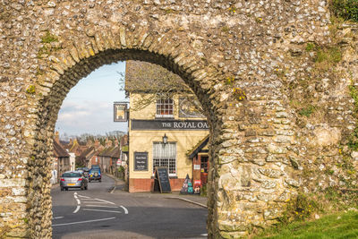 View of road seen between arch