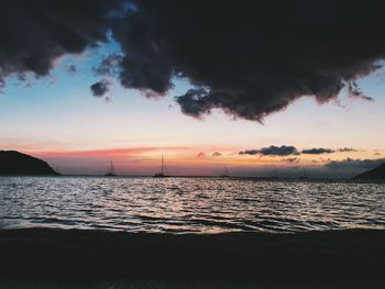 Scenic view of sea against sky during sunset