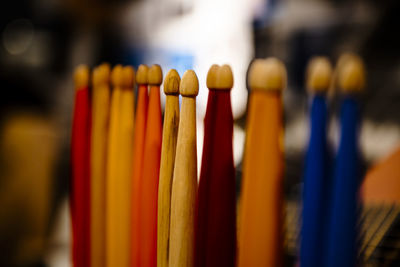 Close-up of multi colored drum sticks