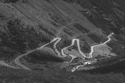 High angle view of winding road on land
