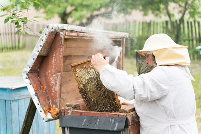 Side view of a man working