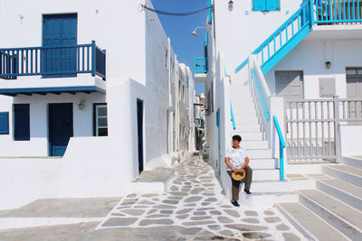 Low angle view of woman resting in mykonos