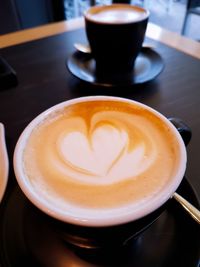 High angle view of cappuccino on table