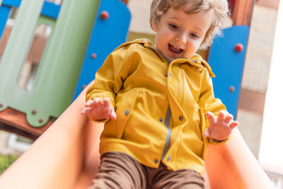 Cute boy playing at playground