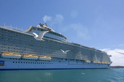 Ship in sea against sky