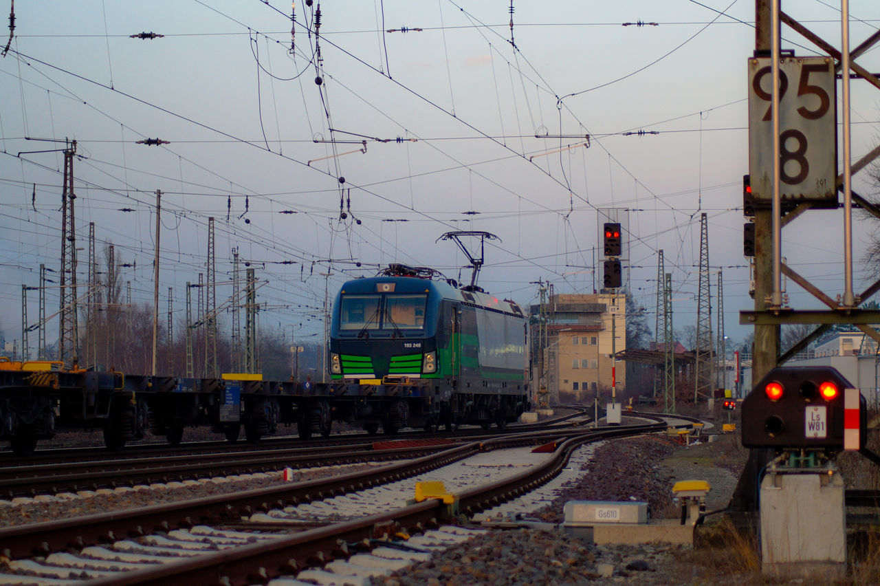 TRAIN ON RAILROAD TRACKS DURING WINTER