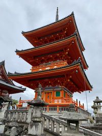 Low angle view of temple building against sky