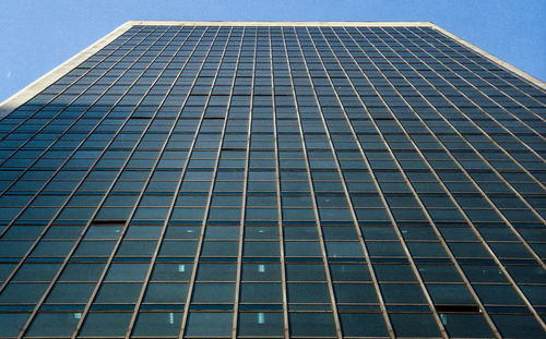 Low angle view of modern building against clear sky