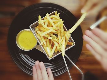 Cropped image of person having food