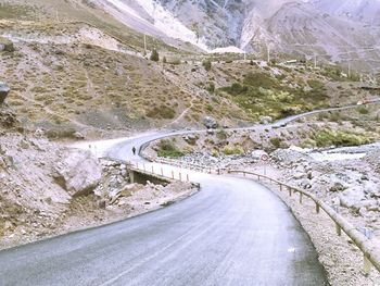 Road leading towards mountains