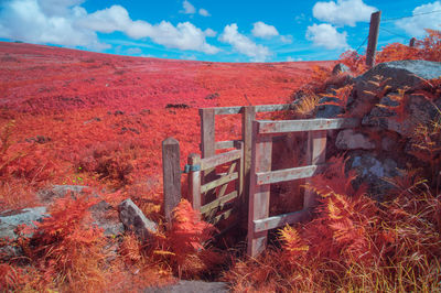 Abandoned built structure on land against sky
