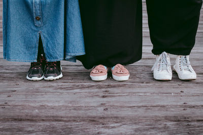Low section of people standing on floor