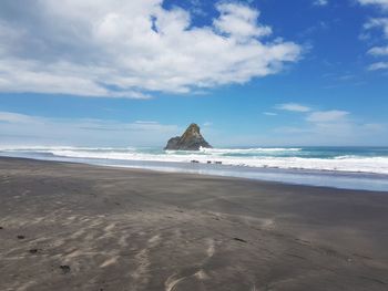Scenic view of beach against sky