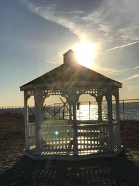 Built structure at beach against sky