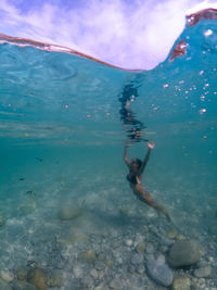 Man swimming in sea