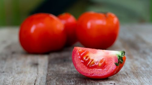 Close-up of red fruit on table