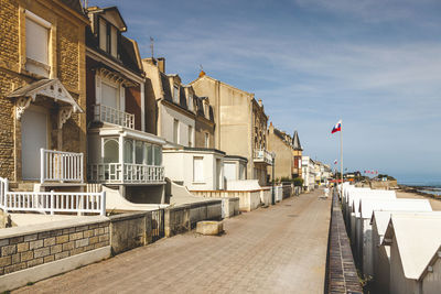 Traditional houses lined up on the promenade of a seaside resort in brittany