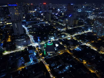 Aerial view of illuminated cityscape at night