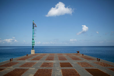 Scenic view of sea against blue sky