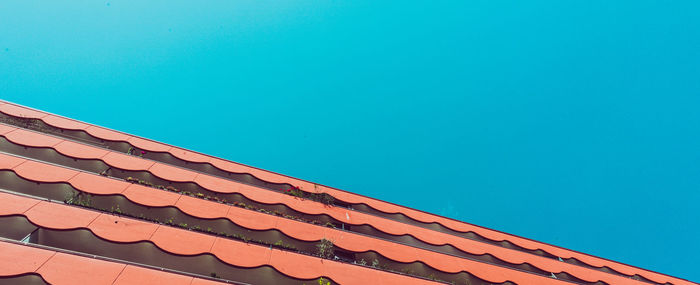 Low angle view of building against blue sky