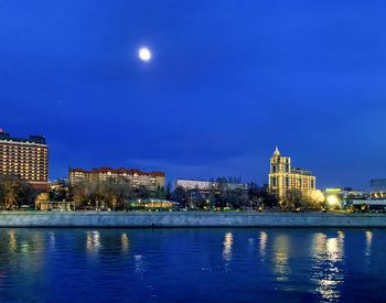 Illuminated buildings in city at night