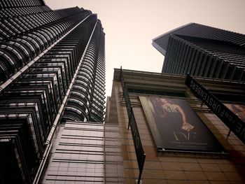 Low angle view of skyscraper against sky