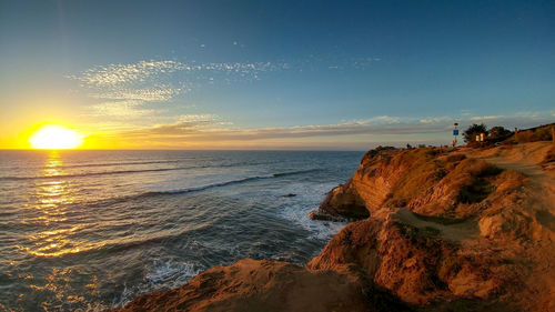 Scenic view of sea against sky during sunset