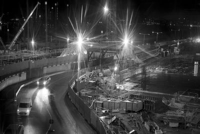 High angle view of illuminated street at night