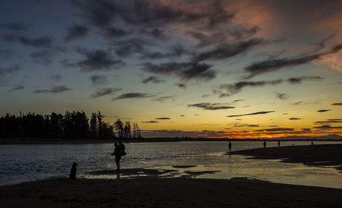 Scenic view of sea at sunset