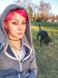 Portrait of woman on field