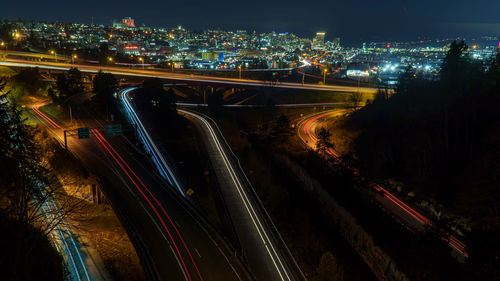 High angle view of illuminated city at night