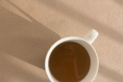 High angle view of coffee cup on table