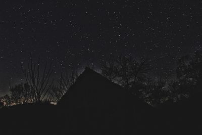 Low angle view of building against sky at night