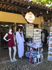 Traditional clothing standing in store