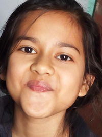 Close-up portrait of smiling woman