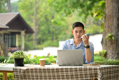 Young woman using mobile phone